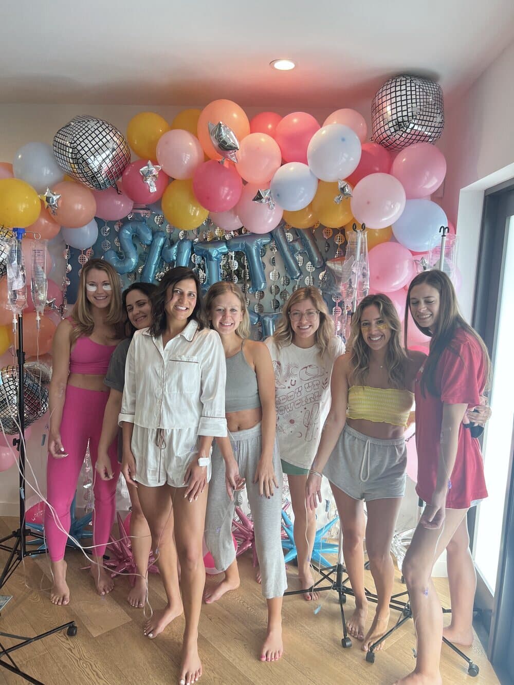 A bachelorette group glowing at their party with Iso IV mobile hydration