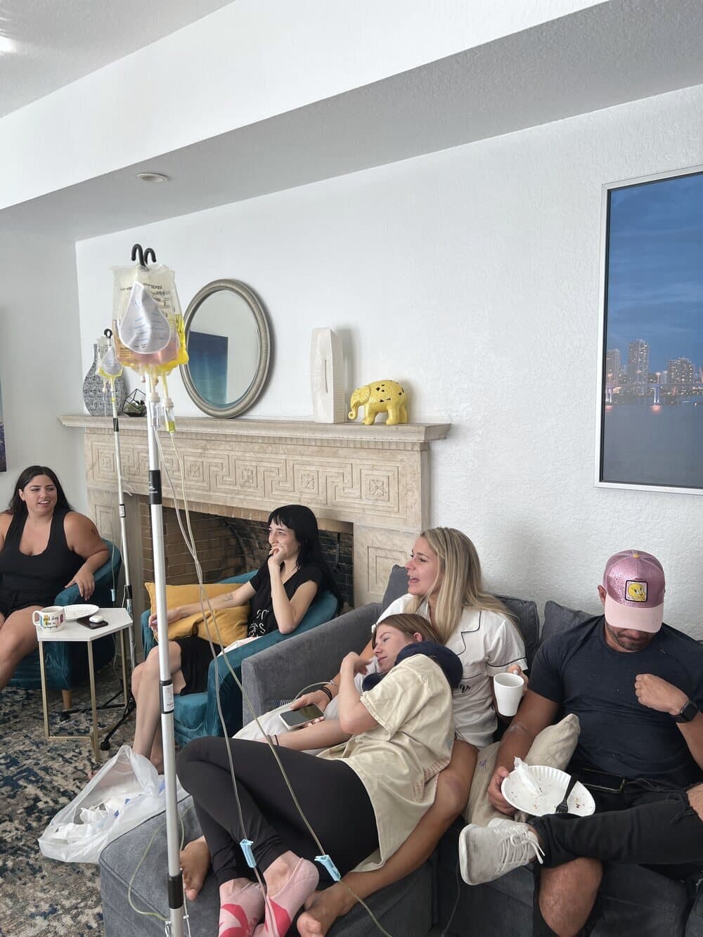 An Iso IV group relaxing together during an at-home hydration session in South Florida